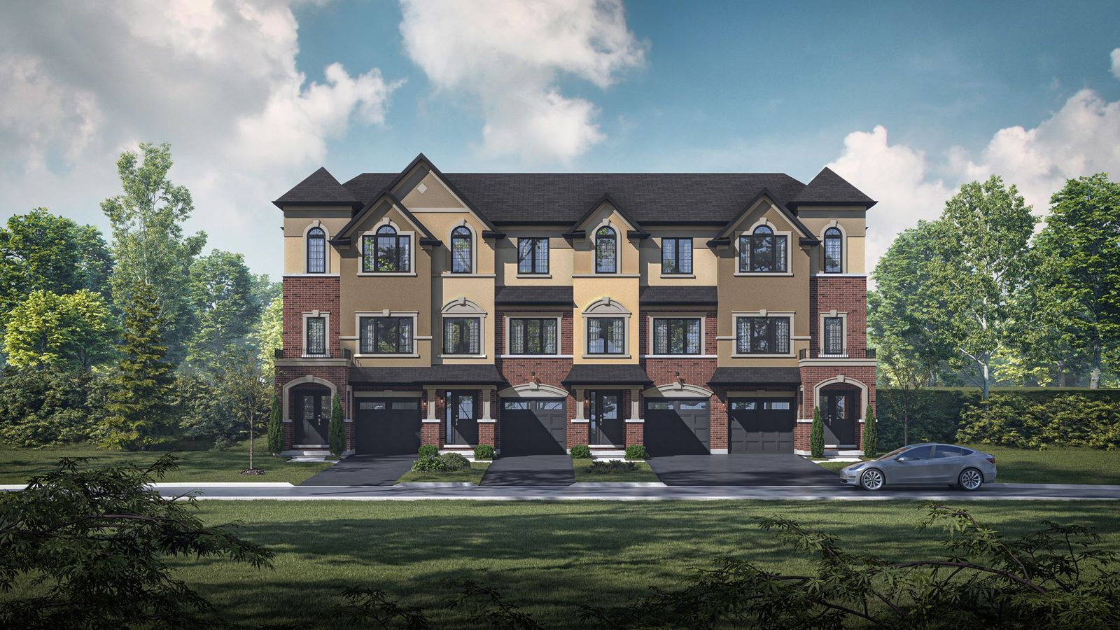 Three-storey brick and stucco townhome block with single-car garages